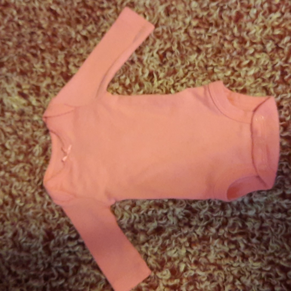 Preemie pink carter's long sleeve one piece.